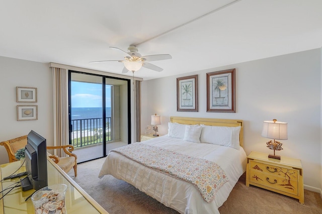 carpeted bedroom featuring ceiling fan, floor to ceiling windows, and access to exterior