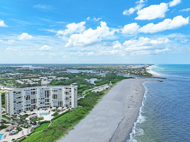 bird's eye view with a beach view and a water view