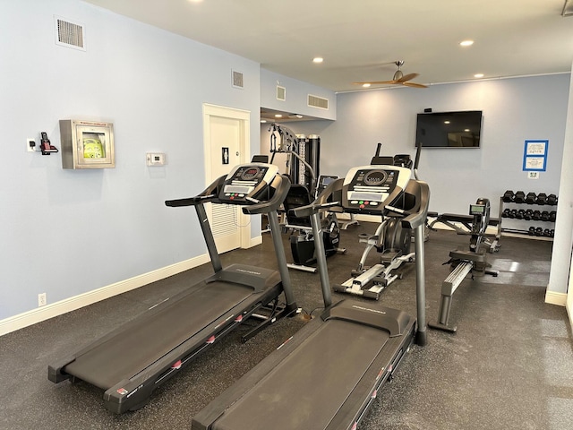 exercise room with ceiling fan