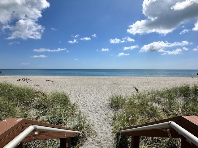 property view of water featuring a beach view