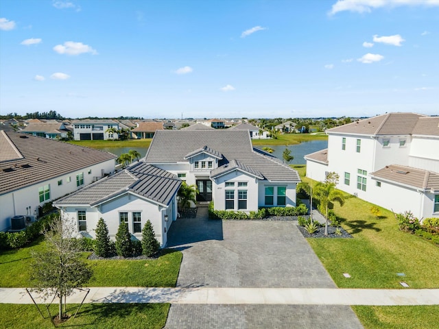 drone / aerial view with a water view