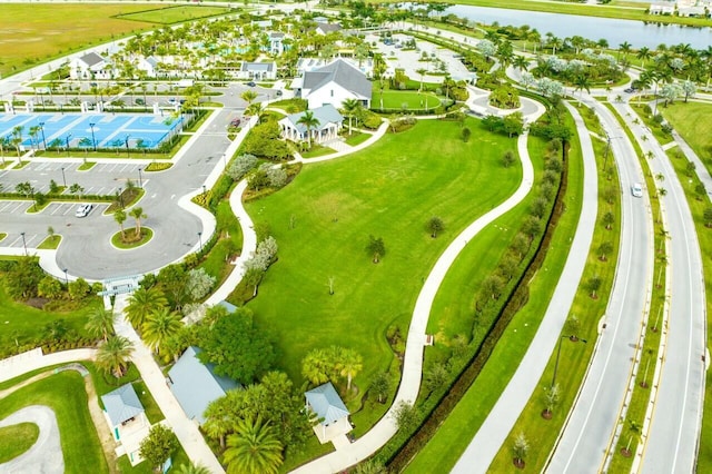 birds eye view of property featuring a water view