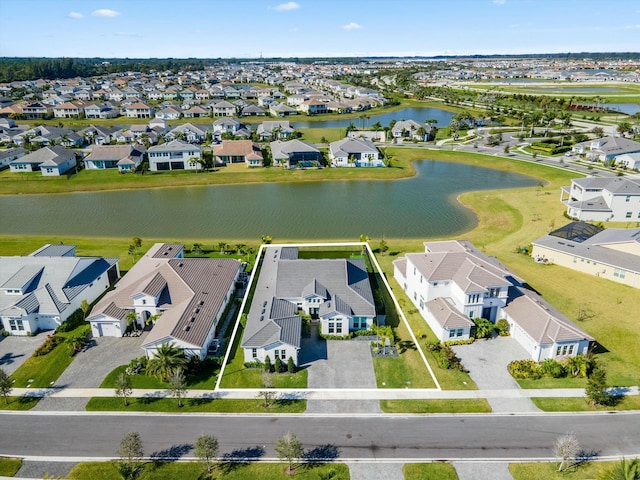 bird's eye view with a water view