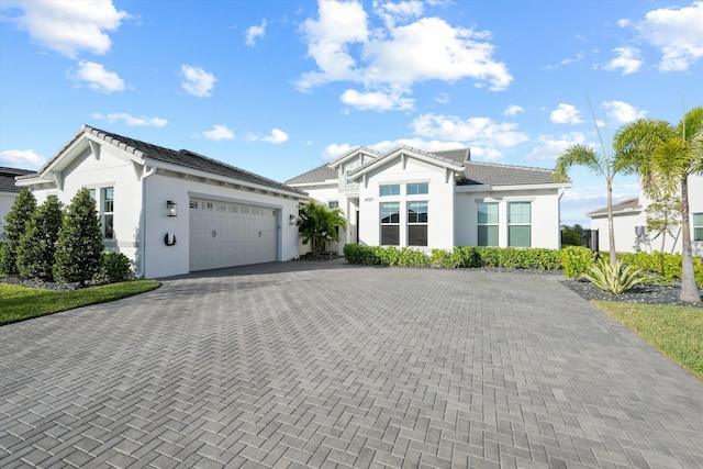 view of front of property featuring a garage