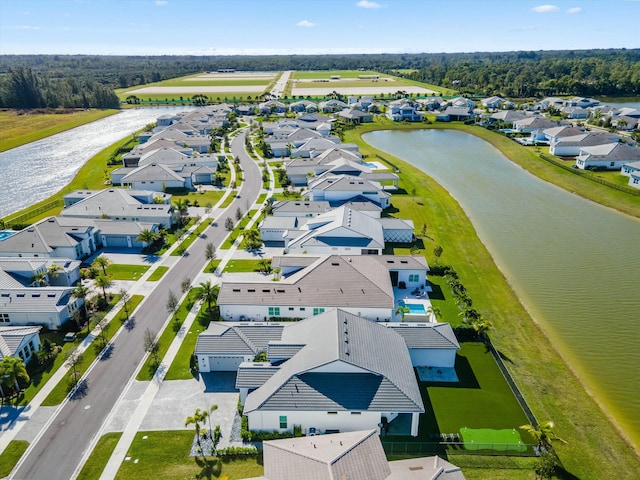 drone / aerial view with a water view