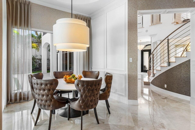 dining room featuring ornamental molding