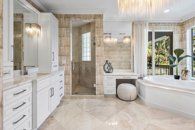 bathroom with plus walk in shower, vanity, and crown molding