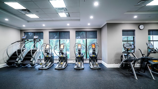 workout area featuring a paneled ceiling