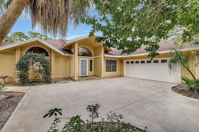 view of front of property with a garage