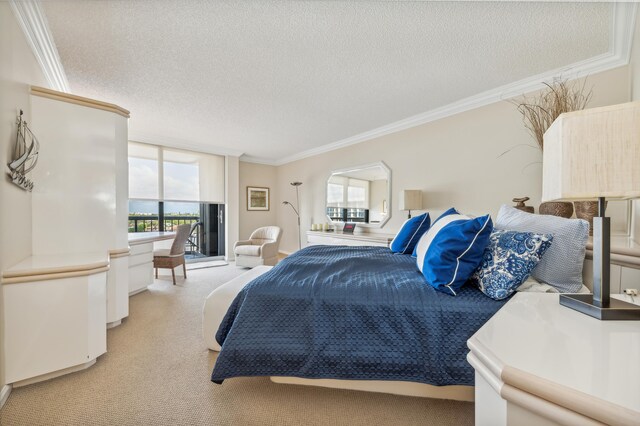 4748 S Ocean Blvd Unit 802, Highland Beach, FL 33487 - bedroom featuring a textured ceiling, ornamental molding, light carpet, and access to exterior
