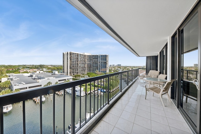 balcony featuring a water view