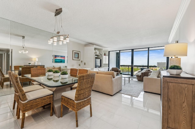 4748 S Ocean Blvd Unit 802, Highland Beach, FL 33487 - dining area featuring a chandelier, crown molding, light tile patterned floors, a textured ceiling, and a wall of windows