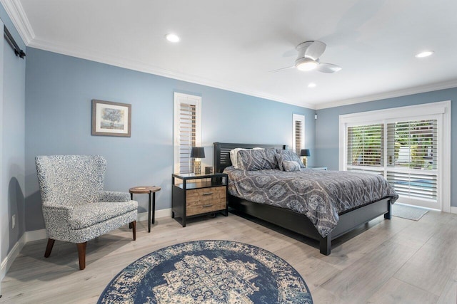 bedroom with ceiling fan, light hardwood / wood-style floors, and ornamental molding