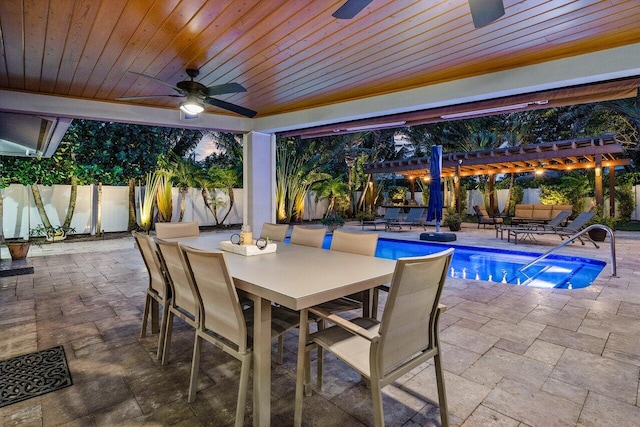 exterior space featuring ceiling fan, a pergola, and a fenced in pool