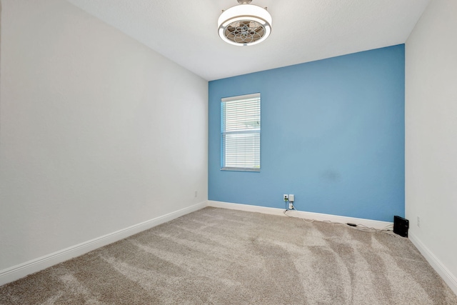 empty room featuring carpet flooring