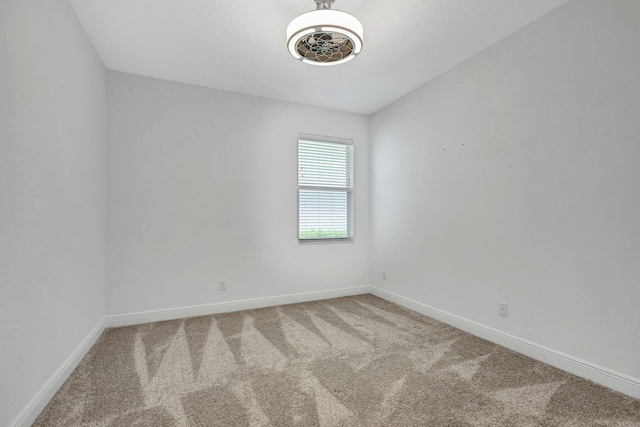 spare room with carpet floors