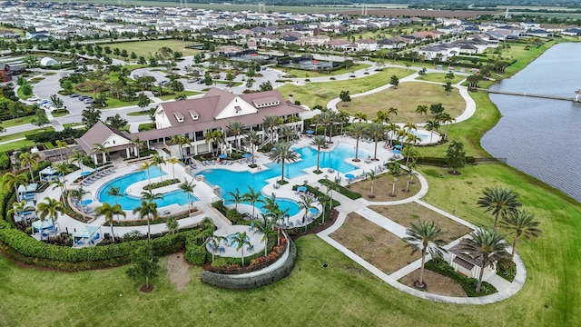 drone / aerial view with a water view