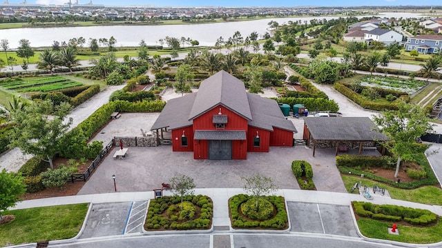 drone / aerial view with a water view