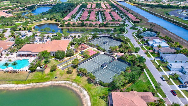 birds eye view of property featuring a water view