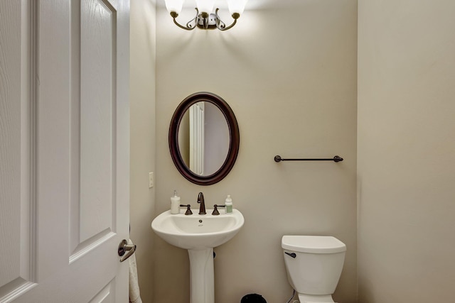 bathroom featuring toilet