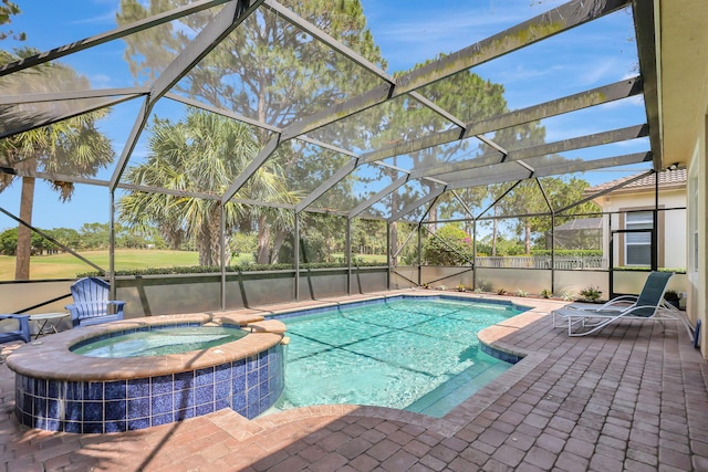 view of pool with an in ground hot tub, a patio area, central AC unit, and a lanai