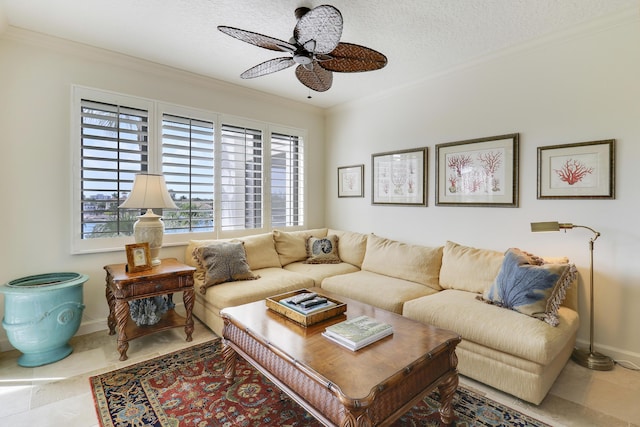 living room featuring tile patterned flooring, a textured ceiling, ceiling fan, and crown molding