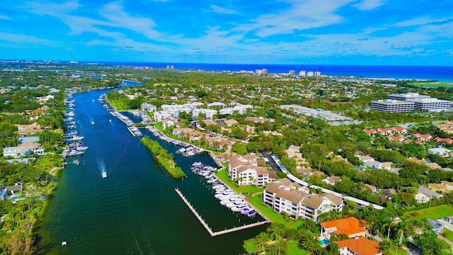 drone / aerial view with a water view