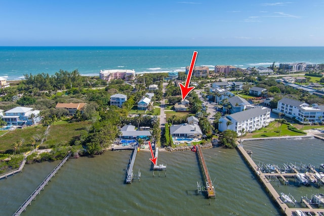 bird's eye view with a water view