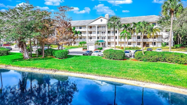 view of property with a water view