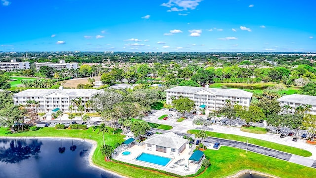 drone / aerial view featuring a water view