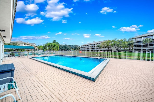 view of swimming pool featuring a patio