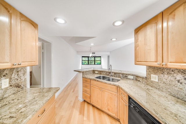 kitchen with light stone countertops, sink, black dishwasher, light hardwood / wood-style floors, and light brown cabinetry