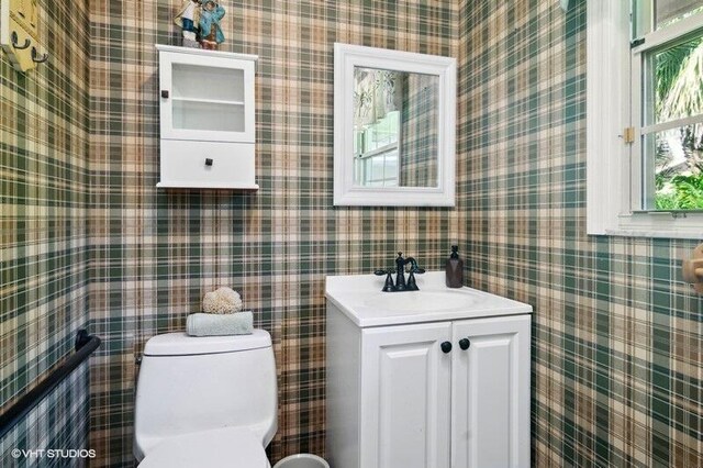 bathroom with vanity and toilet