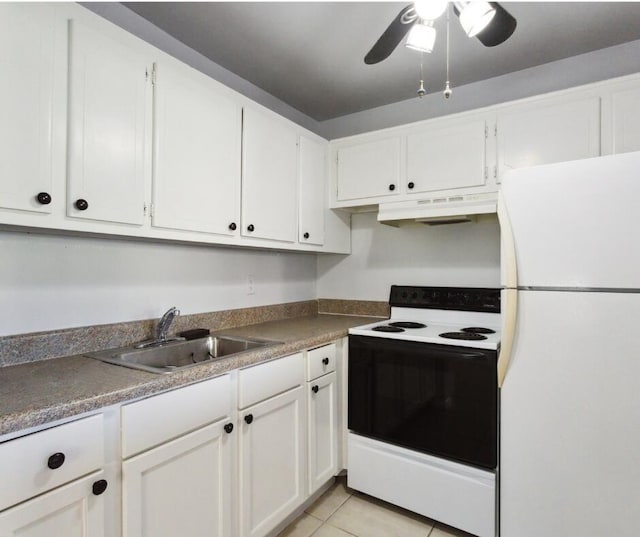 kitchen with white cabinets, light tile patterned flooring, white appliances, and sink