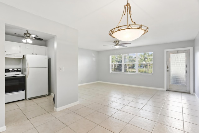 kitchen featuring pendant lighting, white appliances, white cabinets, light tile patterned floors, and range hood