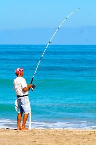 property view of water featuring a beach view