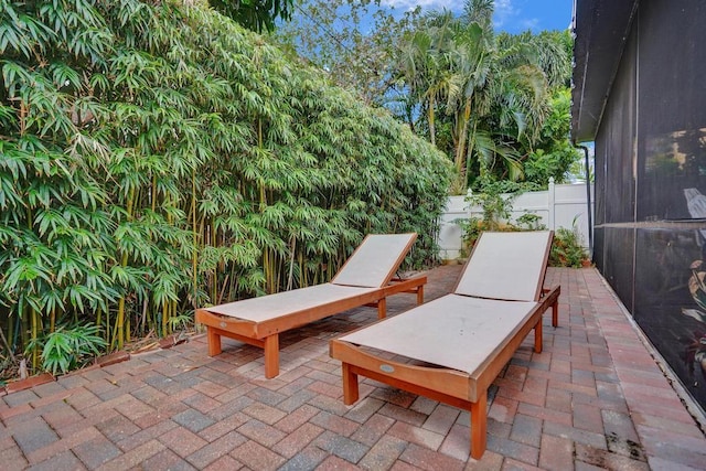 view of patio / terrace featuring fence