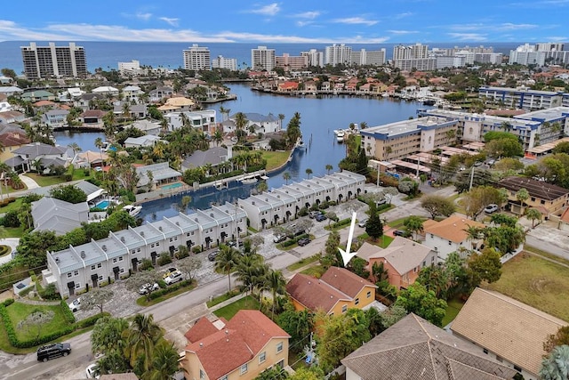 bird's eye view with a water view and a city view