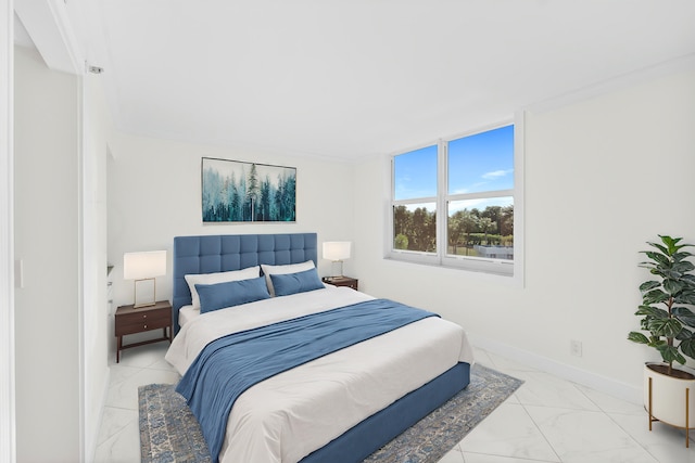 bedroom with crown molding