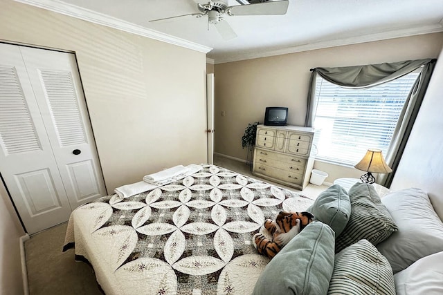 bedroom with a closet, ceiling fan, and ornamental molding