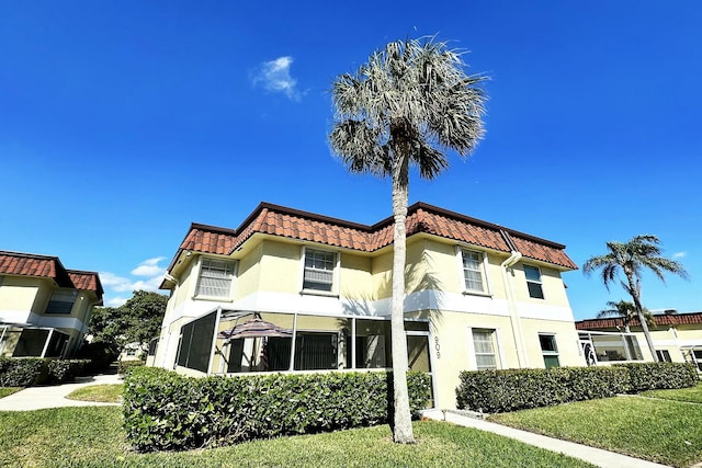 exterior space featuring a front yard