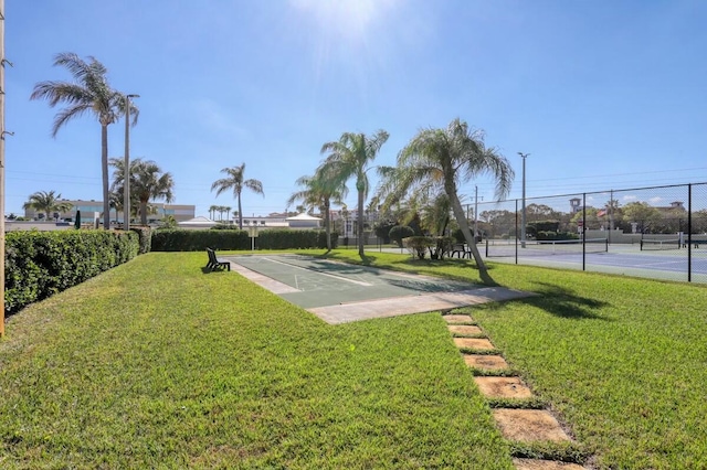 view of yard with tennis court