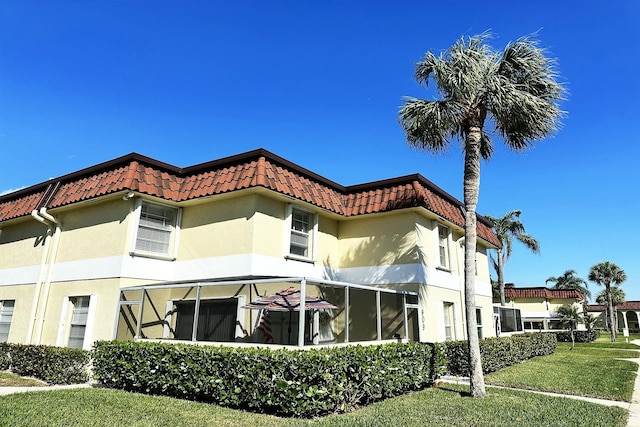 exterior space with a front lawn