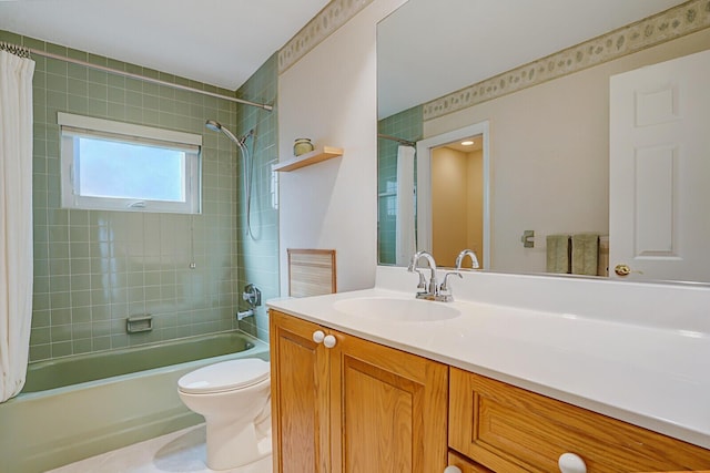 full bathroom with shower / tub combo, vanity, and toilet