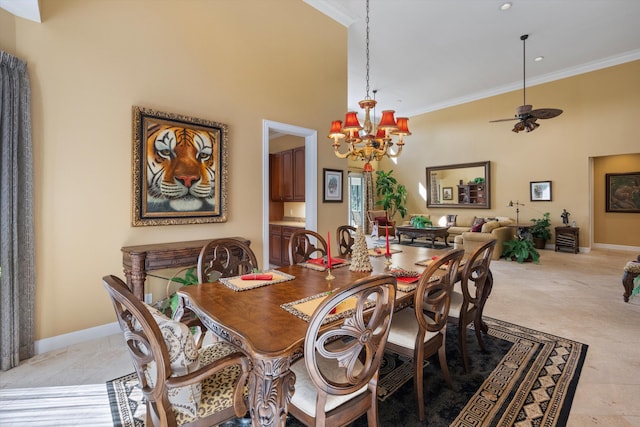 dining space with crown molding and ceiling fan with notable chandelier