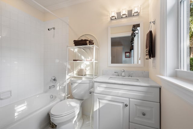 full bathroom with tile patterned floors, vanity, tiled shower / bath combo, and toilet