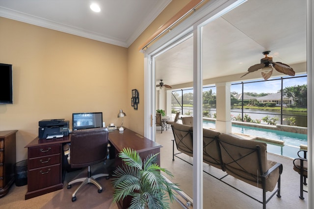 office area featuring ceiling fan and crown molding