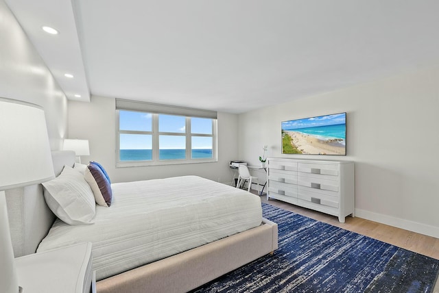 bedroom featuring wood-type flooring