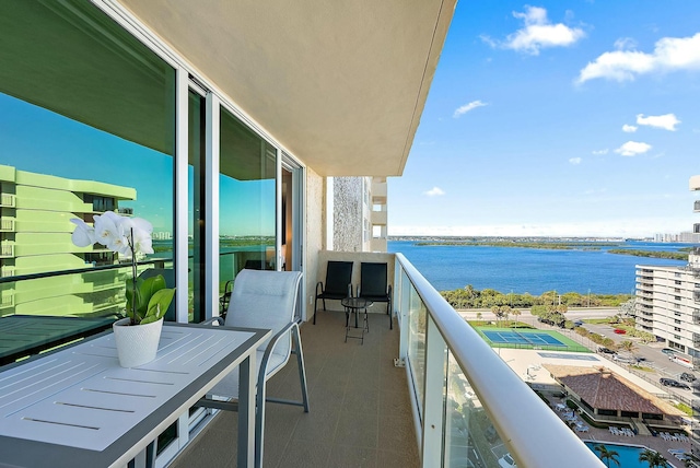 balcony featuring a water view