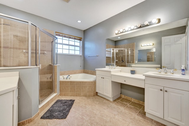 bathroom featuring tile patterned floors, vanity, and separate shower and tub